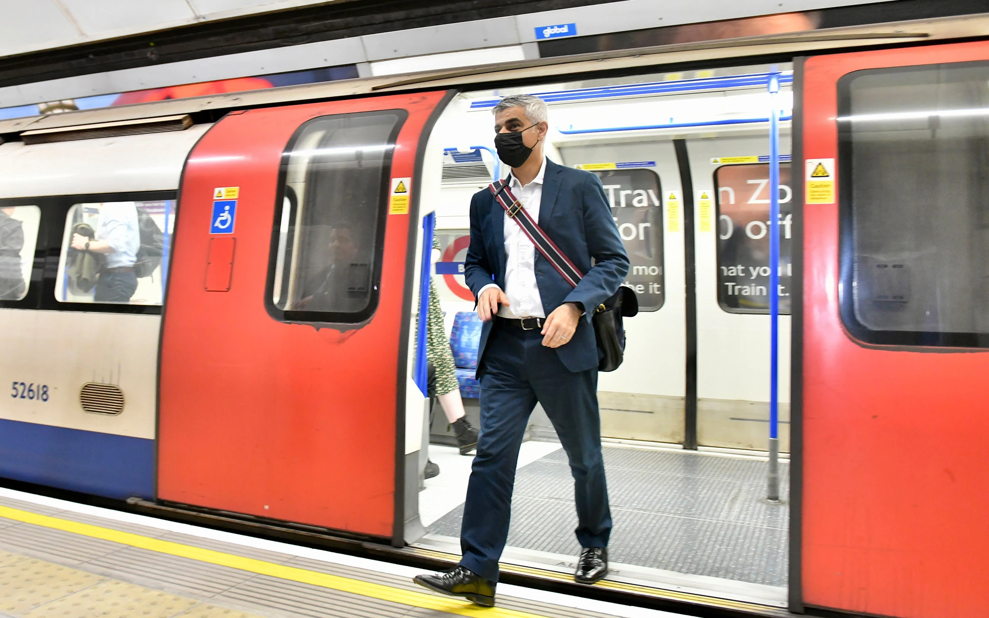 sadiq khan existing train at bank station