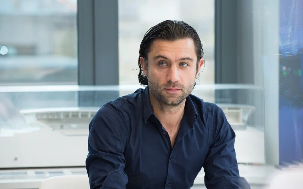 portrait of associate director alex kyriakides