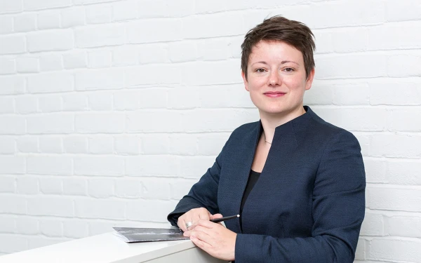 portrait of associate director heidi mergl
